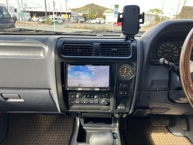 ランドクルーザープラド TX 3.0ディーゼルTB・8人乗・ナロボディー・フルタイム4WD・全塗装車・社外ナビ・フルセグ・Bカメラ・ETC・キーレス・リヤヒーター・ウッドコンビH・丸目フェイス・グリル・社外16AW・ホワイトレター(29枚目)