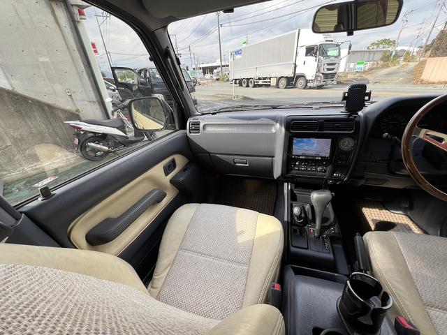 ランドクルーザープラド TX 3.0ディーゼルTB・8人乗・ナロボディー・フルタイム4WD・全塗装車・社外ナビ・フルセグ・Bカメラ・ETC・キーレス・リヤヒーター・ウッドコンビH・丸目フェイス・グリル・社外16AW・ホワイトレター(38枚目)