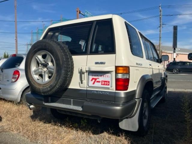 ビッグホーン 　プレジールＩＩ　純正アルミ　３列シート　７人乗り　記録簿　車検令和９年１１月　ターボ交換済（10枚目）