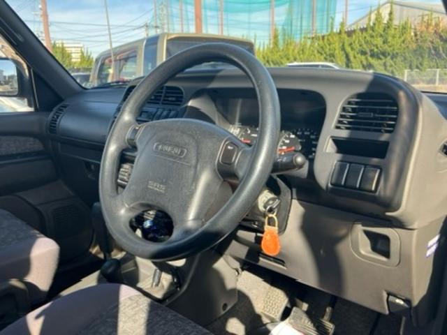 ビッグホーン 　プレジールＩＩ　純正アルミ　３列シート　７人乗り　記録簿　車検令和９年１１月　ターボ交換済（25枚目）