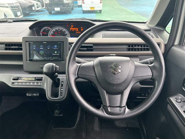 ワゴンＲ ハイブリッドＦＸ　ＥＴＣ　バックカメラ　ナビ　クリアランスソナー　レーンアシスト　衝突被害軽減システム　オートライト　スマートキー　アイドリングストップ　電動格納ミラー　シートヒーター　ベンチシート　ＣＶＴ（3枚目）