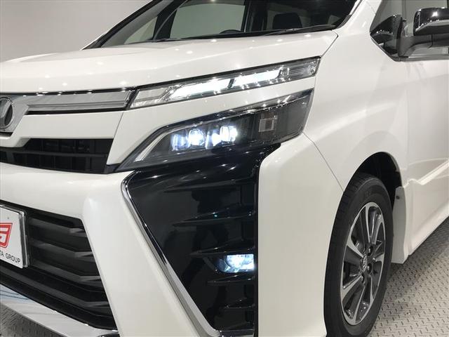 ヴォクシー ZS 煌 地上デジタル TSS 両側パワードア アイドリングストップ車 パワーウィンド 横滑防止 整備記録簿 DVD可 盗難防止装置 スマートエントリー Bカメラ AUX LEDヘッドライト メモリーナビ AW(34枚目)