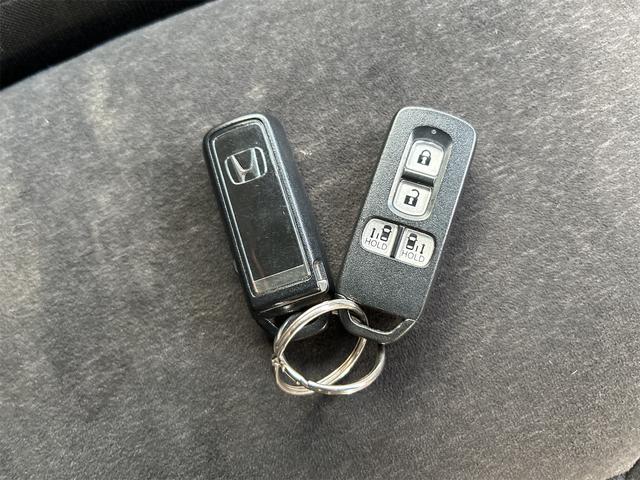 N-BOXカスタム ETC バックカメラ 両側電動スライドドア TV クリアランスソナー オートクルーズコントロール レーンアシスト 衝突被害軽減システム オートライト スマートキー アイドリングストップ 電動格納ミラー(64枚目)