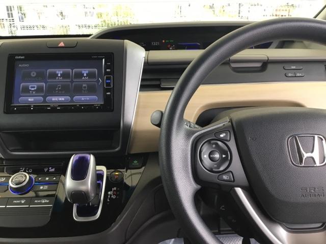 フリードハイブリッド ハイブリッド・Ｇホンダセンシング　両側電動スライドドア　クルコン　純正ナビ　ＥＴＣ　ドラレコ　軽減ブレーキ　キーフリーシステム　ＤＶＤ再生可能　ＥＣＯＮ　後カメラ　Ａクルーズ　地デジフルセグＴＶ　ＬＥＤヘッドランプ　横滑防止　ナビＴＶ（3枚目）