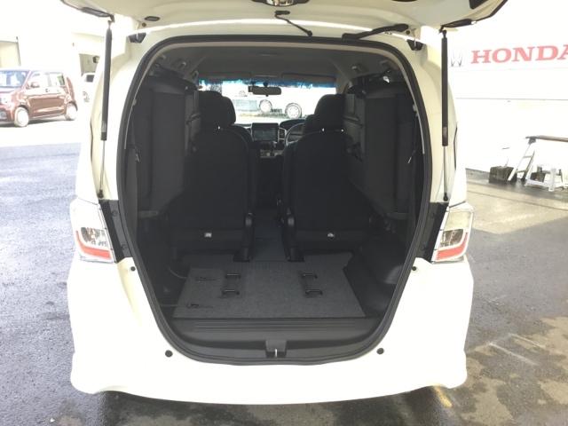 フリードハイブリッド ジャストセレクション　片側電動スライドドア　純正ナビ　フルセグ　ＥＴＣ　前後ドラレコ　両側スライド片側電動ドア　ナビテレビ　セキュリティー　横滑り防止機能　オートクルーズ　地デジ　エアバック　ウォークスルー　ＤＶＤ再生可能（9枚目）