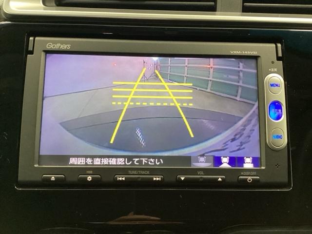 フィット １３Ｇ・Ｆパッケージ　バックカメラ　純正ナビ　ワンセグ　ＥＴＣ　イモビ　ＤＶＤ再生可能　スマ－トキ－　ＶＳＡ　助手席エアバッグ　Ｒカメラ　オートエアコン　エアバック　ＰＳ　キ－フリ－　１セグ　ＰＷ　ＡＢＳ　ＴＶナビ（3枚目）
