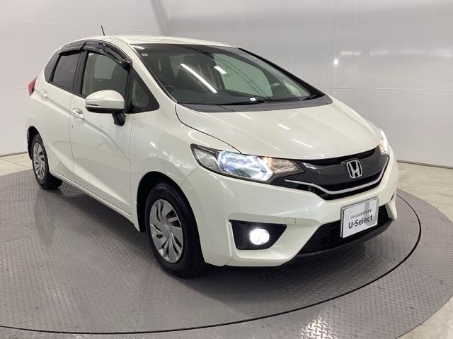 フィット １３Ｇ・Ｆパッケージ　バックカメラ　純正ナビ　ワンセグ　ＥＴＣ　イモビ　ＤＶＤ再生可能　スマ－トキ－　ＶＳＡ　助手席エアバッグ　Ｒカメラ　オートエアコン　エアバック　ＰＳ　キ－フリ－　１セグ　ＰＷ　ＡＢＳ　ＴＶナビ（7枚目）