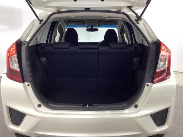 フィット １３Ｇ・Ｆパッケージ　バックカメラ　純正ナビ　ワンセグ　ＥＴＣ　イモビ　ＤＶＤ再生可能　スマ－トキ－　ＶＳＡ　助手席エアバッグ　Ｒカメラ　オートエアコン　エアバック　ＰＳ　キ－フリ－　１セグ　ＰＷ　ＡＢＳ　ＴＶナビ（18枚目）