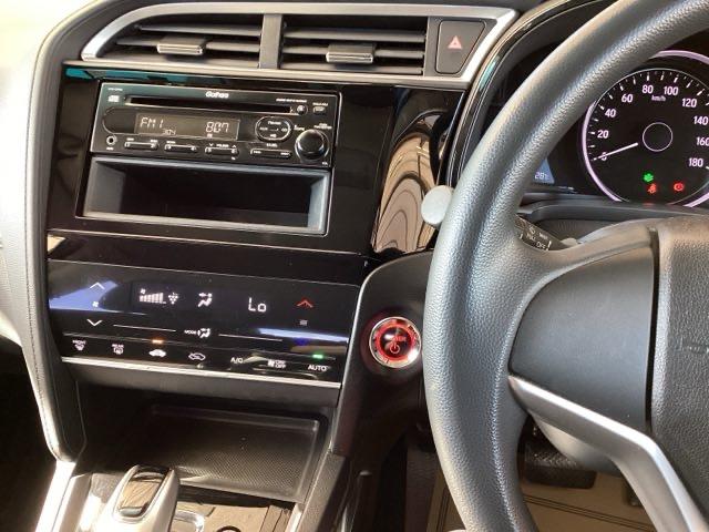 シャトル ハイブリッドホンダセンシング ETC スマートキー デュアルエアバッグ 横滑り防止 パワステ 盗難防止 パワーウインドウ キーレス ABS エコモード オートクルーズ フルオートエアコン 衝突回避ブレーキ 運転席エアバック(2枚目)