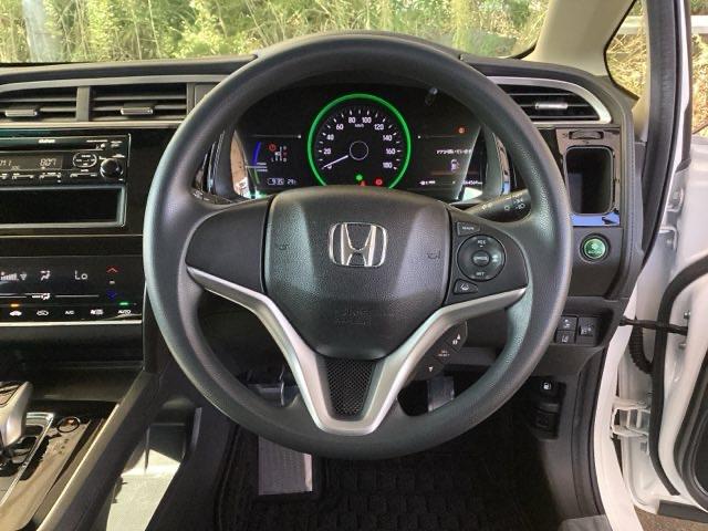 シャトル ハイブリッドホンダセンシング ETC スマートキー デュアルエアバッグ 横滑り防止 パワステ 盗難防止 パワーウインドウ キーレス ABS エコモード オートクルーズ フルオートエアコン 衝突回避ブレーキ 運転席エアバック(18枚目)