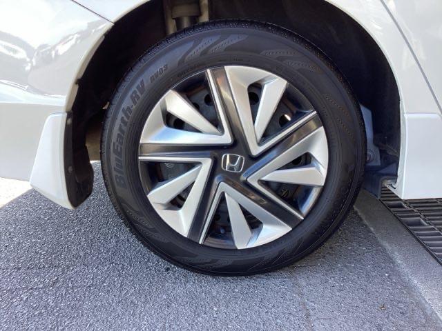 シャトル ハイブリッドホンダセンシング ETC スマートキー デュアルエアバッグ 横滑り防止 パワステ 盗難防止 パワーウインドウ キーレス ABS エコモード オートクルーズ フルオートエアコン 衝突回避ブレーキ 運転席エアバック(25枚目)