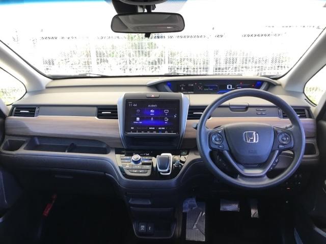 フリードハイブリッド ハイブリッド・Gホンダセンシング 片側ハンズフリースライドドア 純正ナビ ETC クルコン 衝突被害軽減B バックカメラ シートヒーター 軽減ブレーキ キーフリーシステム DVD再生可能 ECON 後カメラ Aクルーズ シートH(2枚目)