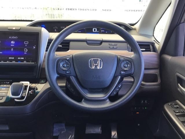 フリードハイブリッド ハイブリッド・Gホンダセンシング 片側ハンズフリースライドドア 純正ナビ ETC クルコン 衝突被害軽減B バックカメラ シートヒーター 軽減ブレーキ キーフリーシステム DVD再生可能 ECON 後カメラ Aクルーズ シートH(16枚目)