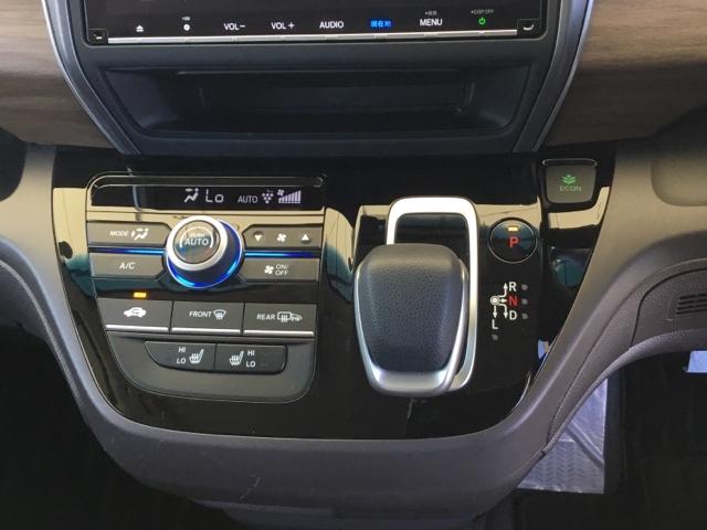 フリードハイブリッド ハイブリッド・Gホンダセンシング 片側ハンズフリースライドドア 純正ナビ ETC クルコン 衝突被害軽減B バックカメラ シートヒーター 軽減ブレーキ キーフリーシステム DVD再生可能 ECON 後カメラ Aクルーズ シートH(20枚目)