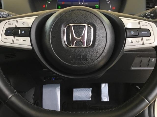 フィット ｅ：ＨＥＶホーム　デモカー　クルコン　純正ナビ　フルセグ　ＥＴＣ　前後ドラレコ　前後誤発進抑制機能　クリソナ　助手席エアバッグ　運転席エアバッグ　アイドリングストップ　禁煙　ＬＥＤライト　ＵＳＢ接続　バックカメラ（18枚目）