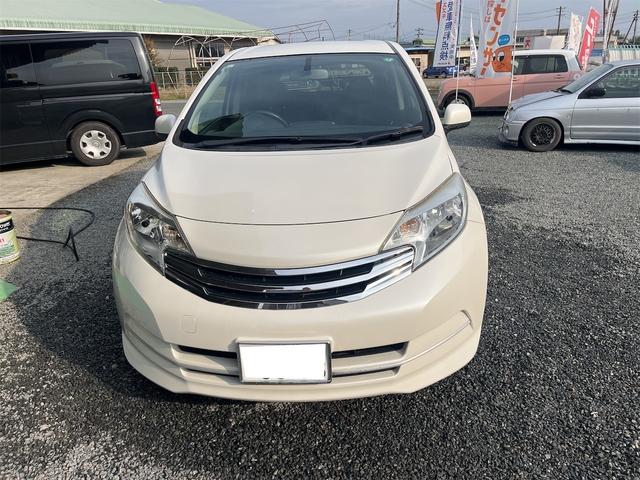 ノート ライダー ETC TV アルミホイール スマートキー アイドリングストップ 電動格納ミラー CVT 盗難防止システム 衝突安全ボディ ABS スーパーチャージャー エアコン パワーステアリング(2枚目)