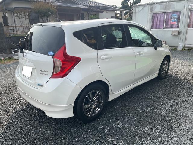 ノート ライダー ETC TV アルミホイール スマートキー アイドリングストップ 電動格納ミラー CVT 盗難防止システム 衝突安全ボディ ABS スーパーチャージャー エアコン パワーステアリング(5枚目)