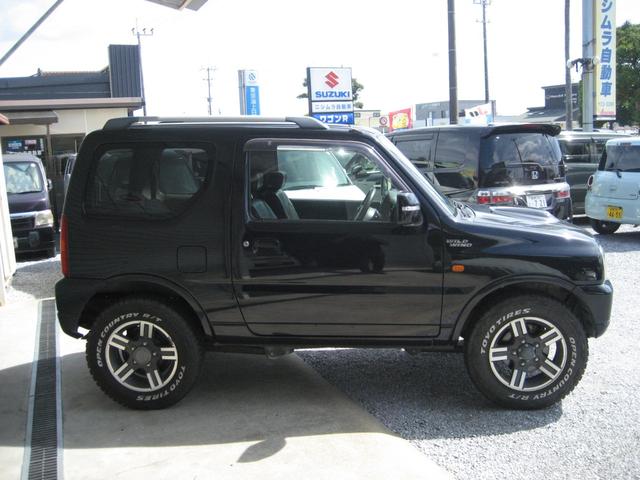 ジムニー ワイルドウインド ワイルドウインド 5速 4WD 専用レザーシート 純正アルミ ホワイトレタータイヤ キーレス Wエアバック ABS シートヒーター パワーウインドウ(4枚目)