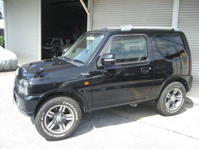 ジムニー ワイルドウインド ワイルドウインド 5速 4WD 専用レザーシート 純正アルミ ホワイトレタータイヤ キーレス Wエアバック ABS シートヒーター パワーウインドウ(5枚目)