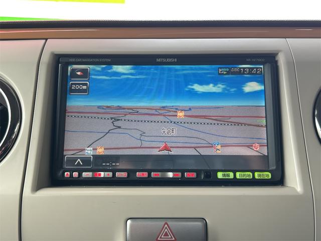 アルトラパンショコラ Ｘ　ナビ　オートライト　ＨＩＤ　スマートキー　アイドリングストップ　電動格納ミラー　ベンチシート　ＣＶＴ　盗難防止システム　ＡＢＳ　ＣＤ　ＤＶＤ再生　衝突安全ボディ　エアコン　パワーステアリング（4枚目）