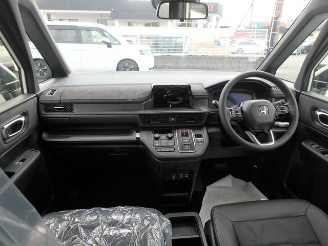 ステップワゴン e:HEVスパーダ プレミアムライン 登録済未使用車 リアカメラ 両側電動スライドドア 衝突防止軽減ブレーキ スマートキー プッシュスタート LEDヘッドライト レーンサポート ソナー クルーズコントロール パワーゲート Wシートヒーター(11枚目)