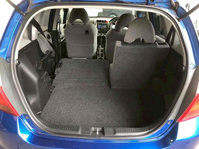 フィット 1.3A ETC キーレスエントリー 電動格納ミラー CVT 衝突安全ボディ ABS CD MD エアコン パワーステアリング パワーウィンドウ(19枚目)