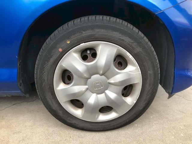 フィット 1.3A ETC キーレスエントリー 電動格納ミラー CVT 衝突安全ボディ ABS CD MD エアコン パワーステアリング パワーウィンドウ(25枚目)