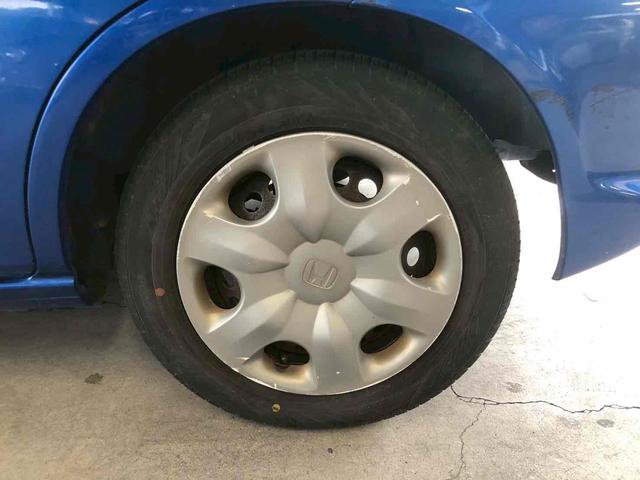 フィット 1.3A ETC キーレスエントリー 電動格納ミラー CVT 衝突安全ボディ ABS CD MD エアコン パワーステアリング パワーウィンドウ(28枚目)