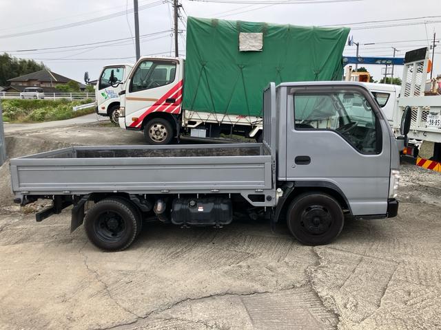 タイタントラック 　平ボディ　１．５ｔ　後Ｗタイヤ　フロアＡＴ　ラジオオーディオ　運転席エアバッグ　エアコン　パワステ　パワーウィンドウ　ＡＢＳ　ターボ　キーレス（4枚目）