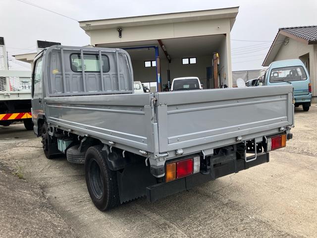 タイタントラック 　平ボディ　１．５ｔ　後Ｗタイヤ　フロアＡＴ　ラジオオーディオ　運転席エアバッグ　エアコン　パワステ　パワーウィンドウ　ＡＢＳ　ターボ　キーレス（8枚目）