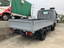 タイタントラック 　平ボディ　１．５ｔ　後Ｗタイヤ　フロアＡＴ　ラジオオーディオ　運転席エアバッグ　エアコン　パワステ　パワーウィンドウ　ＡＢＳ　ターボ　キーレス（6枚目）