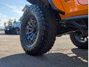 スポーツ　色替全塗装オレンジ　ＲｏｕｇｈＣｏｕｎｔｒｙ　４ｉｎリフトキット　ＴＲＣフェンダー　ＳＭＩＴＴＹＢＩＬＴ　ＸＲＣバンパー　ＦＵＥＬ　ＣＯＶＥＲＴ２０ｉｎ　ＮＩＴＴＯトレイルグラップラー３７ｘ１２．５０（76枚目）