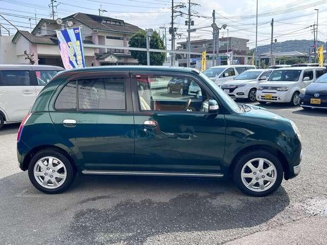 ミラジーノ プレミアムＸ　純正ＣＤ・ＭＤ・イオン付オートＡ／Ｃ・本革調コンビシート・４ＡＴ車・モモ製ウッドコンビハンドル・純正１４インチアルミ・フォク・ウッドコンビシフトノブ＆パネル（5枚目）