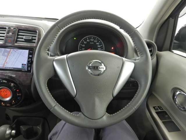 マーチ １．２ボレロ　メモリ－ナビ／ＴＶ　Ｂカメラ　エマブレ　ダブルエアバック　横滑防止装置　電動格納ミラー　ＤＶＤ再生　ナビＴＶ　アイドリングＳ　パワーステアリング　パワーウィンドウ　メモリーナビ　イモビライザー　キーレス　スマートキー　バックモニター　ＡＢＳ（8枚目）