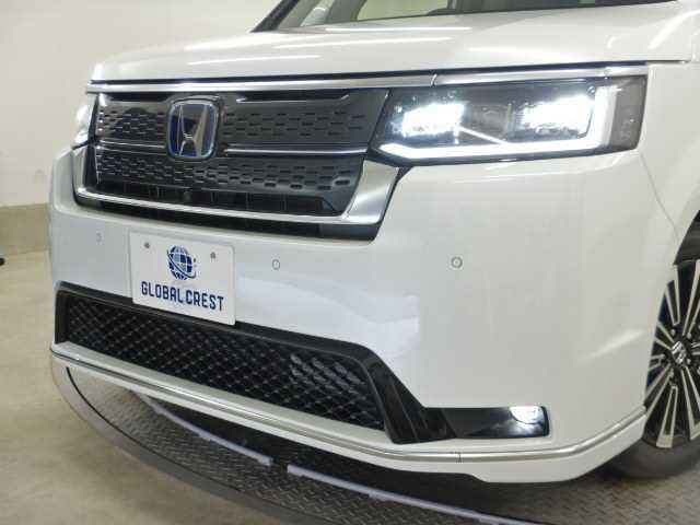 ステップワゴン ２．０ｅ：ＨＥＶ　ＳＰＡＤＡ　ＰＲＥＭＩＵＭ　ＬＩＮＥ　ナビ　マルチカメラ　両側自動ドア　Ｆセグ　ＵＳＢ接続　クリアランスソナ　クルーズＣ　助手席エアバッグ　電格ミラー　スマートＫ　シ－トヒ－タ－　バックカメラ　オットマン　ＬＥＤライト　キーフリー　３列シート（15枚目）