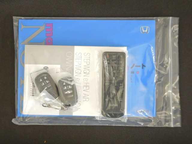 ステップワゴン ２．０ｅ：ＨＥＶ　ＳＰＡＤＡ　ＰＲＥＭＩＵＭ　ＬＩＮＥ　ナビ　マルチカメラ　両側自動ドア　Ｆセグ　ＵＳＢ接続　クリアランスソナ　クルーズＣ　助手席エアバッグ　電格ミラー　スマートＫ　シ－トヒ－タ－　バックカメラ　オットマン　ＬＥＤライト　キーフリー　３列シート（20枚目）