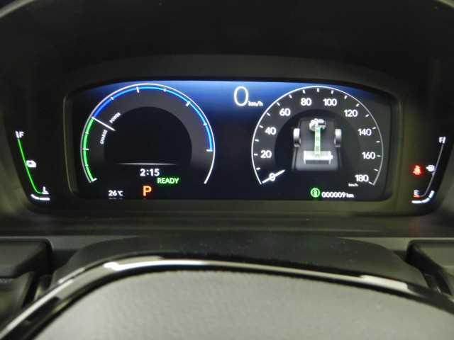 ステップワゴン ２．０ｅ：ＨＥＶ　ＳＰＡＤＡ　ＰＲＥＭＩＵＭ　ＬＩＮＥ　７人　マルチカメラ　両側自動ドア　Ｆセグ　ＵＳＢ接続　クリアランスソナ　クルーズＣ　助手席エアバッグ　電格ミラー　スマートＫ　シ－トヒ－タ－　バックカメラ　オットマン　ＬＥＤライト　キーフリー　３列シート（14枚目）