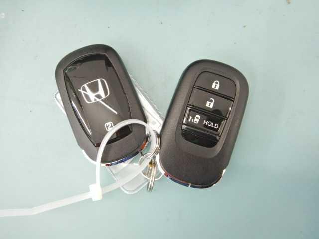 Ｎ－ＢＯＸカスタム Ｎ－ＢＯＸ　ＣＵＳＴＯＭ　ナビ／ＴＶ　バックカメラ　パワースライドア　ＣＭＢＳ　電格ミラー　オートエアコン　スマートキ　ＬＥＤ　盗難防止装置　クルコン　バックカメラ　フルセグＴＶ　パワーステアリング　エアバッグ　ＥＳＣ　パワーウインドウ　オートライト（20枚目）