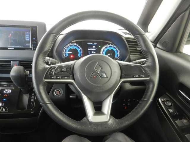 eKクロススペース G ナビ/フルセグTV バックカメラ 両側パワ-スライドドア ブレーキサポート TV 盗難防止装置 Rカメラ LED オートライト ETC 横滑り防止装置 メモリナビ 電動格納ミラー スマートキー アイドリングストップ Wエアバック キーフリーシステム(8枚目)