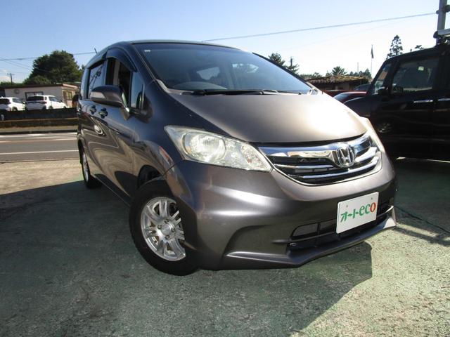 フリード Ｇ　ジャストセレクション　禁煙車／６人乗り／左電動スライドドア／バックカメラ／純正ナビ／フルセグテレビ／ＤＶＤビデオ／ＣＤ／ブルートゥース接続／ＥＴＣ／社外アルミ／ＨＩＤヘッドライト／スマートキー２本（3枚目）