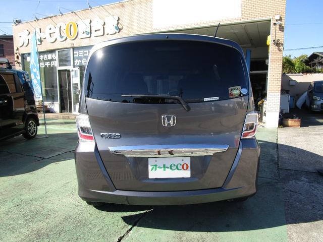 フリード Ｇ　ジャストセレクション　禁煙車／６人乗り／左電動スライドドア／バックカメラ／純正ナビ／フルセグテレビ／ＤＶＤビデオ／ＣＤ／ブルートゥース接続／ＥＴＣ／社外アルミ／ＨＩＤヘッドライト／スマートキー２本（5枚目）