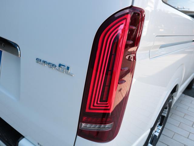 ハイエースバン スーパーＧＬ　ダークプライムＩＩ　登録済み未使用車　ＦＬＥＸフルカスタム　アルパインフローティングナビ　ＨＤＭＩ　フロントスポイラー　オーバーフェンダー　デルフＡＷ　ネオトレーステール　ＥＴＣ　ＰＶＭ　両側パワスラ　デジタルインナー（31枚目）