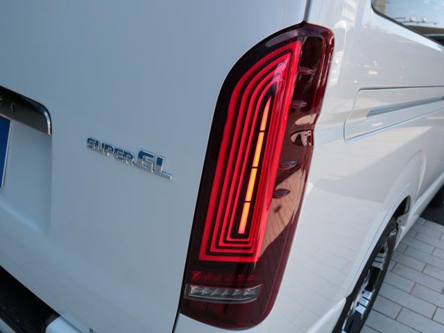 ハイエースバン スーパーＧＬ　ダークプライムＩＩ　登録済み未使用車　ＦＬＥＸフルカスタム　アルパインフローティングナビ　ＨＤＭＩ　フロントスポイラー　オーバーフェンダー　デルフＡＷ　ネオトレーステール　ＥＴＣ　ＰＶＭ　両側パワスラ　デジタルインナー（32枚目）