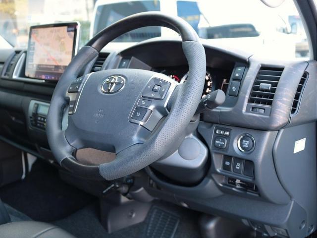 ハイエースワゴン GL ロング シートアレンジvariousヴァリアス 8ナンバーキャンピング 二の字レイアウト フローリング テーブル 前後アルパイン大画面モニター スポイラー デルフ06AW オバフェン LEDテール ローダウン(9枚目)