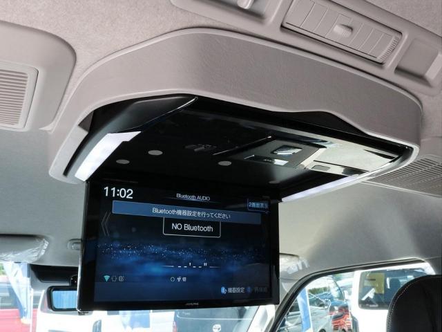 ハイエースワゴン GL ロング シートアレンジvariousヴァリアス 8ナンバーキャンピング 二の字レイアウト フローリング テーブル 前後アルパイン大画面モニター スポイラー デルフ06AW オバフェン LEDテール ローダウン(11枚目)