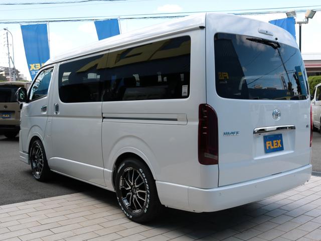 ハイエースワゴン GL ロング シートアレンジvariousヴァリアス 8ナンバーキャンピング 二の字レイアウト フローリング テーブル 前後アルパイン大画面モニター スポイラー デルフ06AW オバフェン LEDテール ローダウン(23枚目)