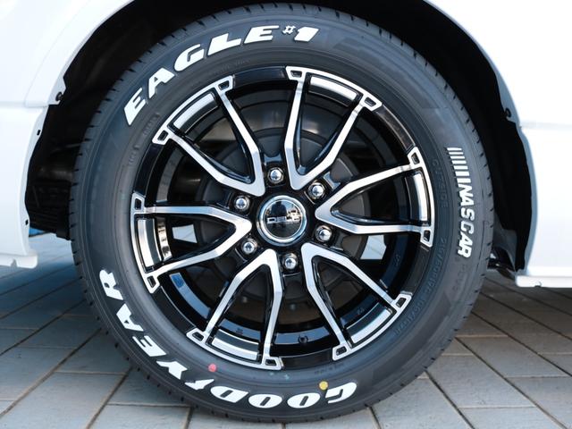 ハイエースワゴン GL ロング シートアレンジvariousヴァリアス 8ナンバーキャンピング 二の字レイアウト フローリング テーブル 前後アルパイン大画面モニター スポイラー デルフ06AW オバフェン LEDテール ローダウン(27枚目)