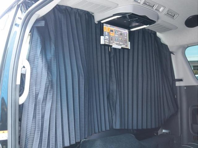 ハイエースワゴン GL ロング シートアレンジニューアス 1400mmセカンドシート フルフラットベッド 床張り テーブル アルパイン大画面ナビ 大画面後席モニター HDMI リアカーテン リアスモーク 前後ドラレコ 天井スピーカー(10枚目)