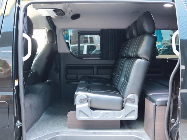 ハイエースワゴン GL ロング シートアレンジニューアス 1400mmセカンドシート フルフラットベッド 床張り テーブル アルパイン大画面ナビ 大画面後席モニター HDMI リアカーテン リアスモーク 前後ドラレコ 天井スピーカー(45枚目)