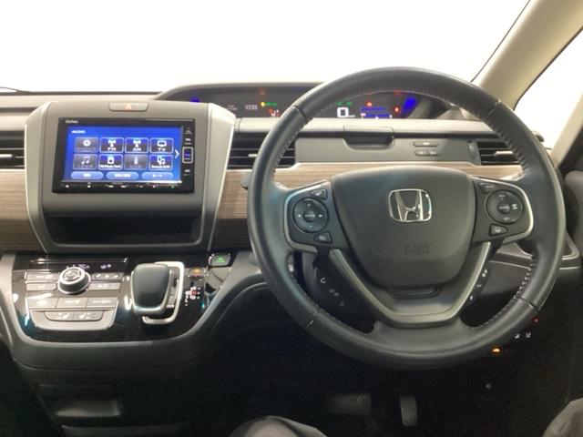 フリード+ハイブリッド ハイブリッド・クロスターホンダセンシング 両側電動スライドドア クルコン バックカメラ 純正ナビ フルセグ ETC シートヒーター 両側電動ドア サイドエアバッグ LEDヘッドライト スマートキー 横滑り防止装置 クルーズコントロール USB(3枚目)